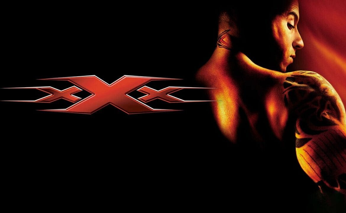 Vin Diesel as Xander Cage in xXx movie performing a daring stunt - action thriller film poster