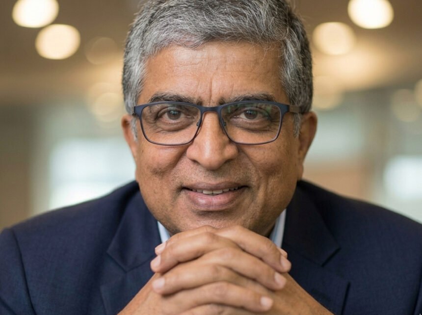 Nandan Nilekani standing in front of a digital projection showcasing futuristic examination security technology and the NTA logo.