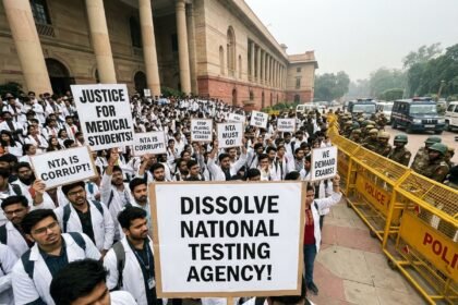 Frustrated students protesting against the National Eligibility cum Entrance Test paper leak with placards outside government buildings.